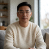 长期观赛用户头像，戴眼镜的中年男性形象